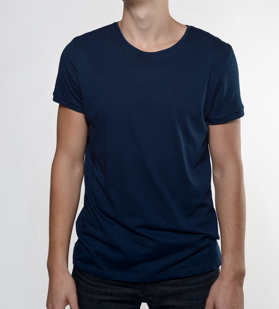 Man in a navy tshirt from front